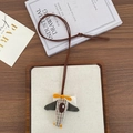 Plaid fabric airplane pendant necklace for kids with orange propeller details - Small Airplane