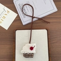 Cute 3D plush cupcake accessory with cherry detail and brown neck cord for kids - Cake Pastry