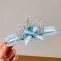Blue princess crown hair clip with bow, pearls, and tulle for kids' bun hairstyles - Star Crown