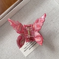 Pinza para el pelo de mariposa en acetato rosa jaspeado con resorte metálico dorado - Rojo