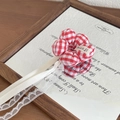 Red gingham flower hair tie with cream ribbon and lace trim for kids' hairstyles - Red