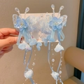 Detailed view of light blue butterfly embroidery hair clips with long beaded tassels - 6-blue Embroidered Butterfly