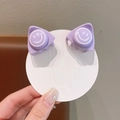 Paar lila Mini-Haarklammern mit Smiley-Motiv auf weißer Präsentationskarte - Violettes Smiley