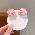 Set of two pink mini bow hair claws for girls on a white round display card - Pink Bowknot