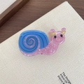 Cute pink and blue snail claw clip featuring a cartoon shell and yellow flower accent - 3-Blue Snail
