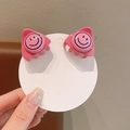 Pair of mini pink cat ear hair clips with blue smiley face design for girls - Rose Red Smiley