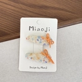 Barrettes à fleurs pour filles avec nœuds orange sur carte de présentation - Style Nœud Orange