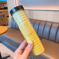 Bright yellow high elasticity wave hair ties in a clear cylindrical storage jar - Yellow