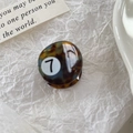 Mini amber tortoiseshell hair clip featuring a retro billiard design with the number 7 - Floral Blue
