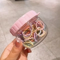 Colorful elastic wavy hair bands for girls in a transparent jar with a pink lid - Pastel Colors