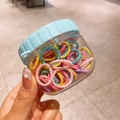Colorful high-elastic thumb hair ties in transparent storage jar with blue lid - Multicolor