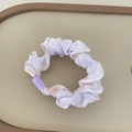 Light purple satin scrunchie with pink heart patterns and purple plastic clasp accent - Purple Scrunchie