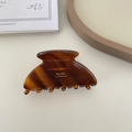 Elegant amber acetate shark hair clip with Barrette La France text and tortoiseshell finish - Caramel Coffee
