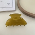 Translucent olive green acetate shark clip with Barrette La France gold lettering - Caramel Green