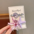 Purple starfish and shell hair clips set for girls featuring pink flower and faux pearls - Purple