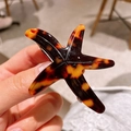 Pasador de pelo de estrella de mar con diseño de carey en fibra de acetato - Carey Oscuro