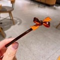 Pasador de pelo con lazo de acetato en acabado resina ámbar y marrón carey vintage - Caramelo