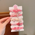 Set de 5 gomas de pelo de temática oceánica en rosa y blanco con estrellas de mar y conchas - Estilo Concha