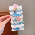 Pack de 5 gomas de pelo infantiles tema océano con sirena estrella y concha - Estilo Delfín