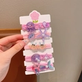 Set de 5 gomas de pelo rosas con bonitas estrellas de mar y criaturas de resina - Estilo Señorita Pulpo