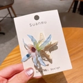 Barrette étoile de mer et fleur en soie bleue sur une carte d'emballage de marque - Pince bec de canard étoile de mer / Bleu Floral