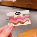 Set of two wavy matte pink and rose hair clips with gold accents on display card - Rose Pink