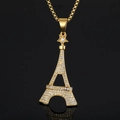 Ciondolo Torre Eiffel dorato con cristalli bianchi e dettaglio stella su fondo nero - Pendente Singolo Oro