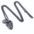 Macro detail of vintage titanium steel arrow pendant with engraved eagle and G letter - Pendant with 60CM Chain