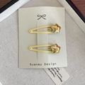 Par de pinzas para el pelo BB doradas brillantes en forma de estrella para niñas - Estilo De Estrella Dorada Brillante (5623032832815) / Amarillo