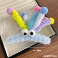 Pince à cheveux amusante en peluche bleue avec spirales colorées et grands yeux rigolos - M / Bleu
