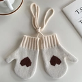 Cozy cream knitted mittens with brown heart patterns and convenient hanging neck string - Off White