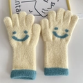 Beige knitted children's gloves with blue smiley faces and ribbed contrast cuffs - Yellow