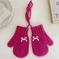 Pink knit toddler mittens with white bow accent and anti-lost neck string for winter - Rose Red