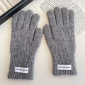 Winter gray knitted gloves for kids with ribbed texture and quality label detail - Gray