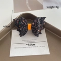 Halloween black bat wing hair clip with colorful sequins and orange center detail - Colorful Shimmer Bat Wings Orange Decor (968-20)