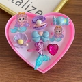 Coffret de 8 bagues sirène pour filles avec formes variées dans une boîte coeur rose - Bague Sirène Violette