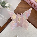 Pince à cheveux papillon holographique rose avec fini perlé pour un style élégant - Rose Clair