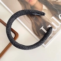 Classic black tweed padded headband with handmade label and elegant woven texture - Black