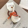 Cute beige goose fabric hair tie with bow and embroidery on a display card - Beige Goose Hair Tie