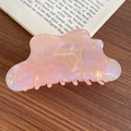 Iridescent pink mermaid large hair claw clip with pearlescent finish on wooden surface - Orange Pink Cloud
