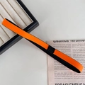 Fascia sportiva elastica arancione e nera con design intrecciato e proprietà antiscivolo - Arancione