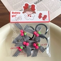 Girl's hair clip set with houndstooth bows and pink cherry pendants on cream tray - Black Cherry Hair Tie