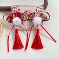 Traditional red fan-shaped hair clips with tassels and plush pom-poms for girls - Red Fan Ribbon