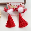 Traditional Chinese fan hair clips with red tassels and soft white plush balls - Red Fan Yellow Flower