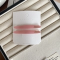 Set of two matte dusty pink French leaf hair clips with gold lettering on display card - Pink