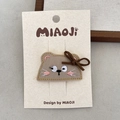 Handmade brown plush animal hair clip with embroidery and velvet bow on card - Brown