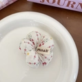 Elastico per capelli in tessuto a fiori rossi su base crema con etichetta logo - Piccolo Fiore Rosso