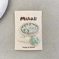 Set of two green lace floral embroidery hair clips on a cream display card for girls - Green Hair Clip