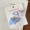 Paire de pinces à cheveux artisanales bleu clair avec motif floral sur carte blanche - Pince Cheveux Cœur Bleu