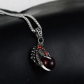 Macro view of vintage silver dragon claw pendant with red stone on black leather background - Dragon Claw Red Bead Pendant Only (Without Chain)